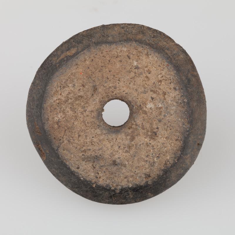 Przęślik gliniany z okrągłym otworem
