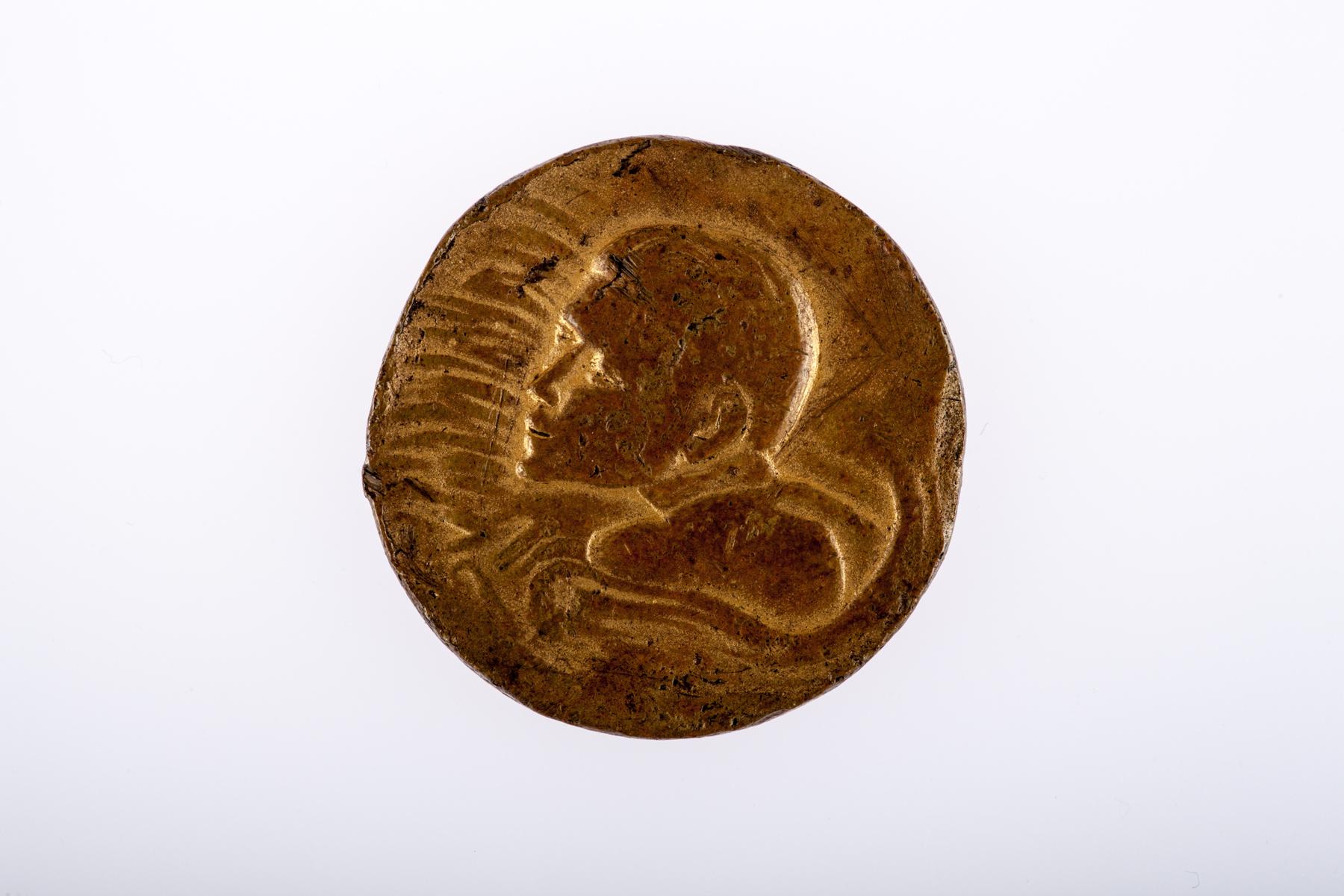 Medal z zawodów pływackich