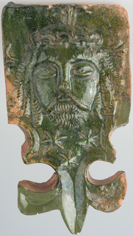 Kafel z wyobrażeniem głowy Chrystusa w koronie cierniowej i częścią w formie lilii