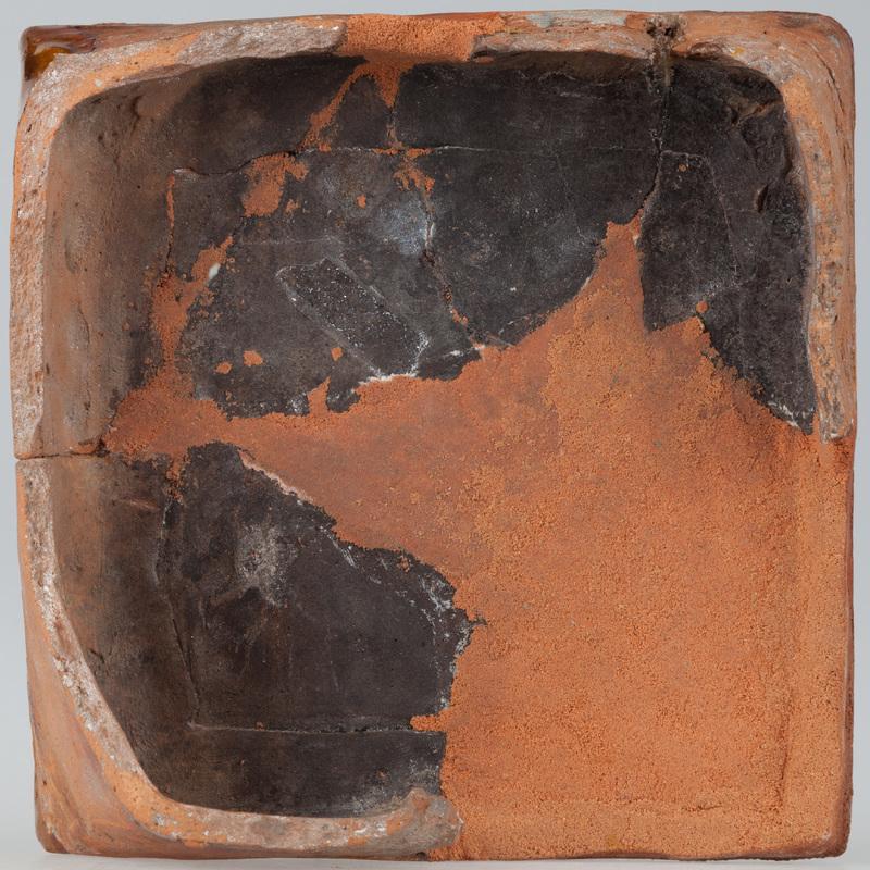 Kafel z giermkiem trzymającym konia