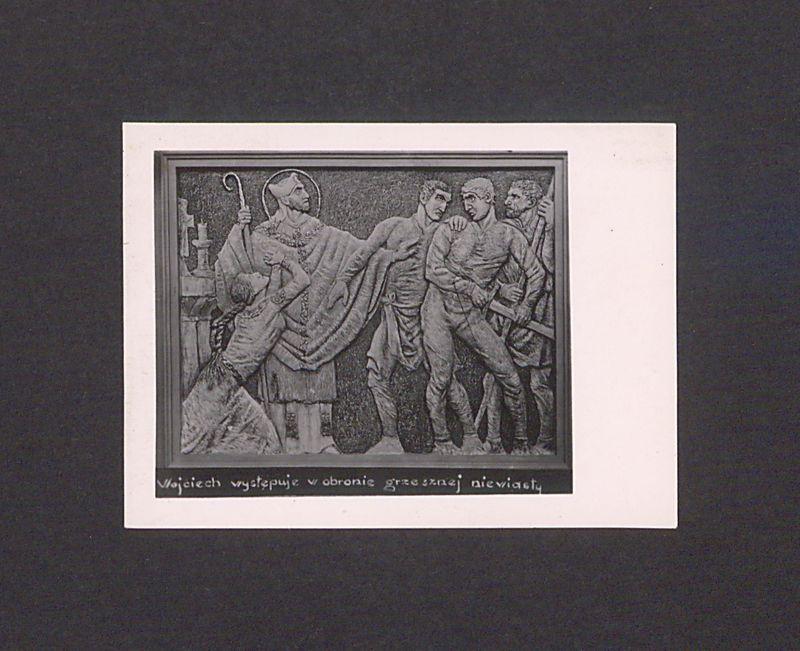 Płaskorzeźba ojca Efrema. Św. Wojciech występuje w obronie grzesznej niewiasty.